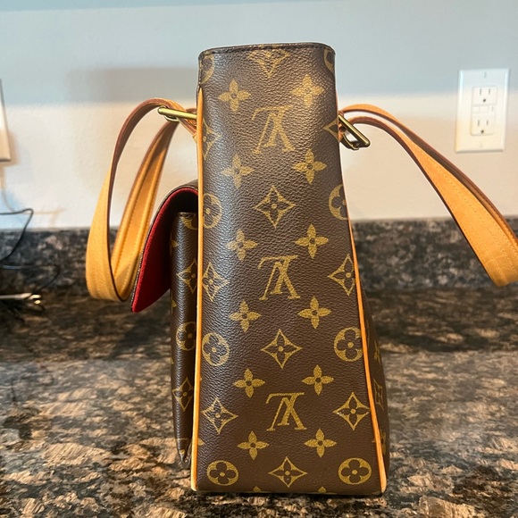 Louis Vuitton Multiplicite. Guaranteed authentic. - Picture 9 of 14